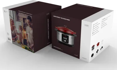 Two boxes of a Lauben OvenSafe Multikocher 6000RS are shown, one with a family in a kitchen and the other with an image of the product and its features.