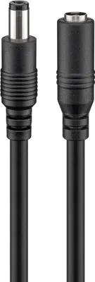 A close-up studio shot of a black DC power extension cable with two connectors.