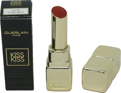 A product shot of a lipstick and its packaging.