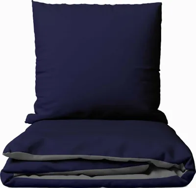 A folded navy blue duvet cover and pillowcase set on a white background.