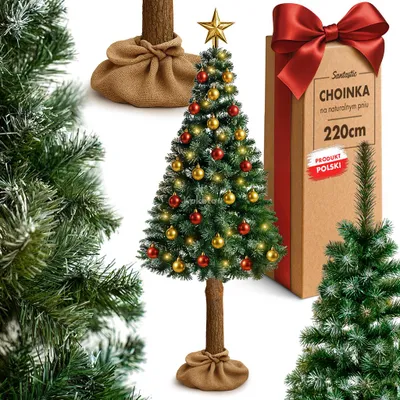 A decorated artificial Christmas tree with a real wood trunk and jute sack base, presented alongside its packaging.