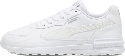 A side view of a white Puma sneaker.
