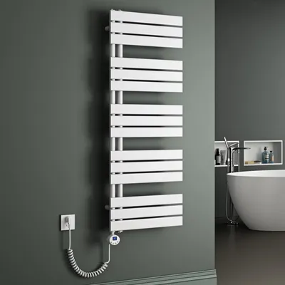 A white electric towel radiator mounted on a dark gray wall in a bathroom setting.