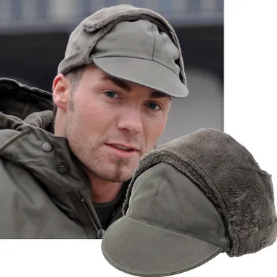A man wearing a winter hat and jacket, with a close-up of the hat.