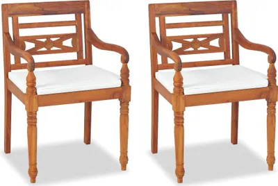 Two wooden chairs with white cushions are shown against a white background.