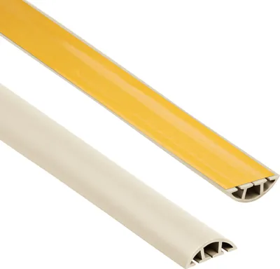 Two pieces of cable management trim are shown against a white background. One piece is beige and the other is a light gray with yellow adhesive backing.