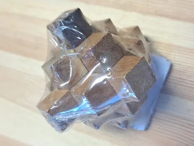 Produktbild von Holz Geduldspiel - Der fallende Stern - Holzpuzzle