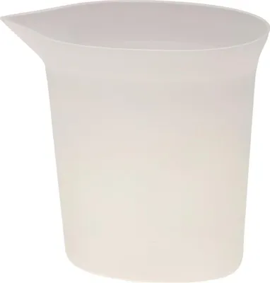 A white measuring cup with a spout.