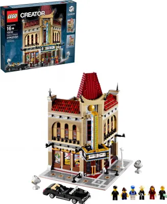 A LEGO Creator Expert set of the Palace Cinema building, with a black convertible car and several minifigures.