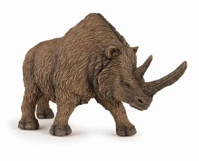 A toy rhinoceros figure on a white background.