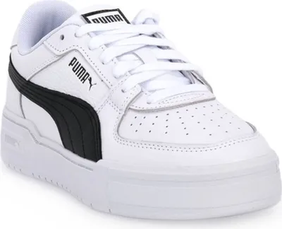 A white Puma sneaker with black accents.