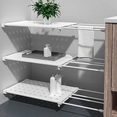 Obrázek produktu pro Unyqoos® Teleskopický regál, nastavitelný – úsporné řešení pro úložný prostor ve skříni, kuchyni a koupelně, montáž bez vrtání, ocelové trubky a ABS plast