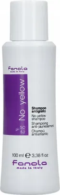 A product shot of a bottle of shampoo.