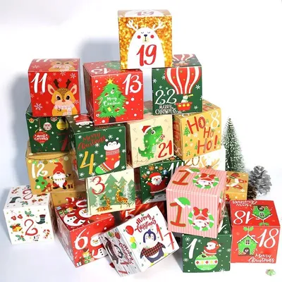 A collection of Christmas-themed gift boxes stacked in a pyramid shape.
