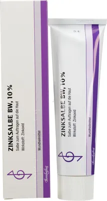 A product shot of a tube of cream and its packaging.