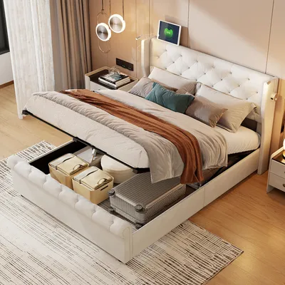 A bedroom scene with a bed that has its storage compartment open, revealing items inside.