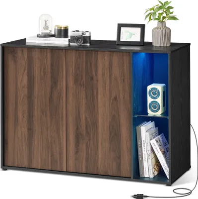 A sideboard with wooden doors and a blue illuminated open compartment displaying a speaker and books.