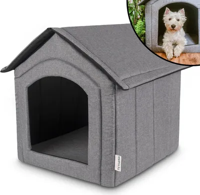 A gray fabric dog house with an arched entrance.