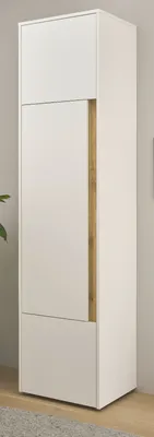 A tall, narrow white cabinet with a wood accent strip, standing against a light gray wall.