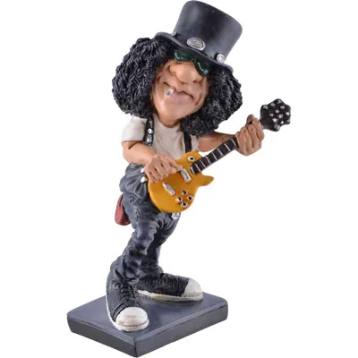 A caricature figurine of a rockstar playing a guitar.