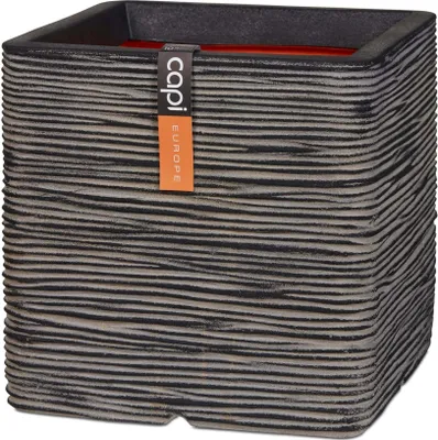 A square planter with a textured ribbed surface and a brand tag attached.
