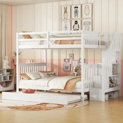 A child's bedroom with a white bunk bed, pull-out trundle, and decorative elements.