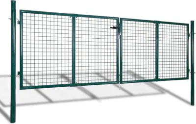 A green metal garden gate with a mesh infill, shown outdoors with shadows cast on the ground.