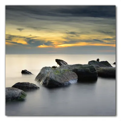 Produktbild von Wallario selbstklebende Möbelfolie/ Tischdecke für Innen und Außen, Größe: 50 x 50 cm - Mystische Felsen im Meer