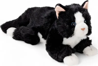 A plush toy cat lying down on a white background.