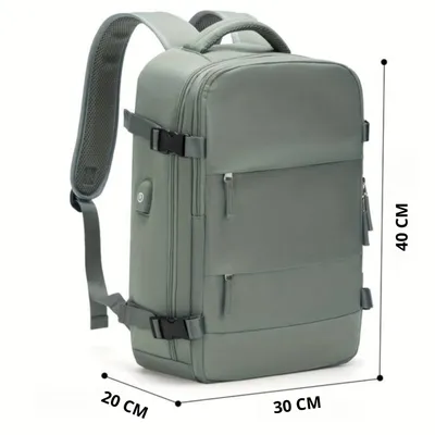 A green backpack with dimensions indicated by measurement lines and text.