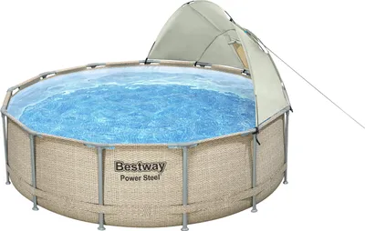 A round above-ground swimming pool with a rattan-like exterior and a canopy for shade.