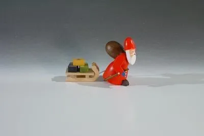 Produktbild von Holzfigur Weihnachtsmann mit Schlitten   Höhe 4,5cm NEU