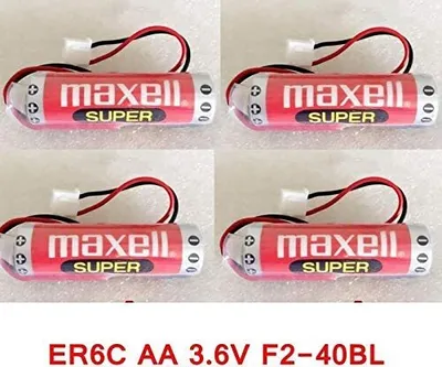 Four Maxell ER6C AA batteries are arranged in a 2x2 grid on a light gray background.