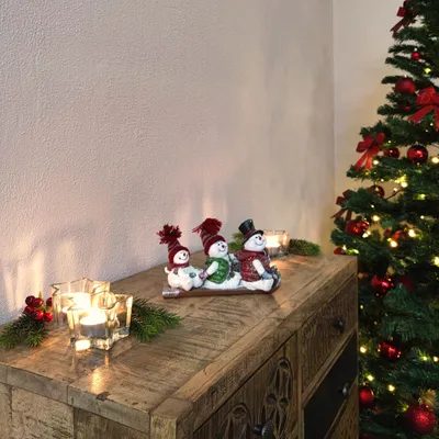 Produktbild von Deko Figur drei Schneemänner ( B ) auf Schlitten