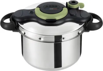 A stainless steel pressure cooker with black and green accents on a white background.