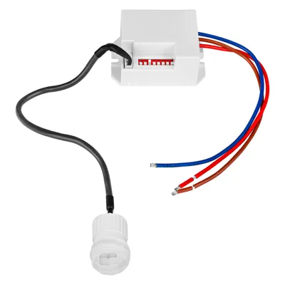 A white motion sensor with attached wires on a white background.