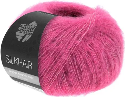 A ball of pink yarn with a black label.