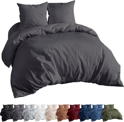 A dark gray duvet cover and pillow set is displayed prominently, with a row of other colored duvet cover and pillow sets shown below.