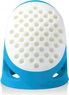 A product shot of a thimble.