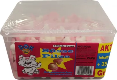 A clear, well-lit product shot of a clear plastic container filled with pink and white gummy candies shaped like mushrooms. The container has a red and yellow label with product information and branding.