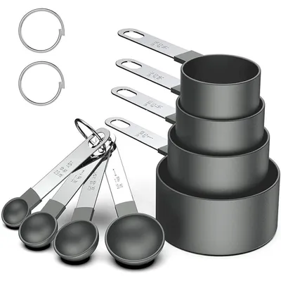 Immagine prodotto di Set da 8 pezzi composto da misurini e cucchiai, colore nero, impilabili, per ingredienti secchi e liquidi