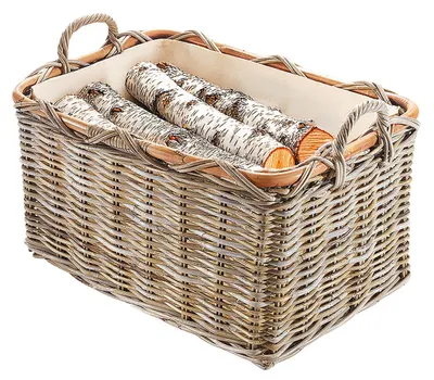 A rectangular wicker basket filled with birch logs, presented against a white background.