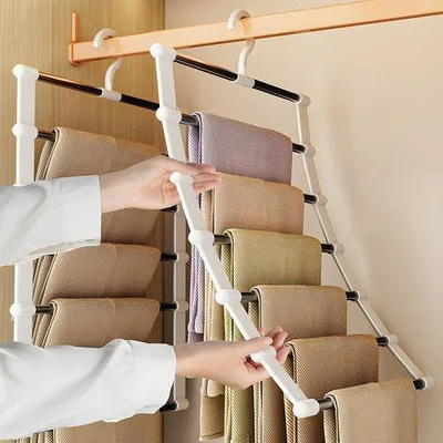 Zdjęcie produktu dla Unyqoos® Zestaw 3 wieszaków na spodnie, oszczędzających miejsce, składanych, 6 sztuk (do 6 spodni na jeden wieszak), ze stali nierdzewnej i ABS, z obrotowym haczykiem o 360°