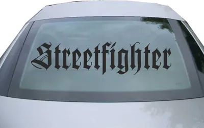 Produktbild von Indigos UG - Aufkleber Heckscheibe & Motorklappe DE2185 - schwarz - 600x142 mm - Streetfighter - Auto Scheiben Fenster Heckklappe Tuning Racing JDM - Die cut