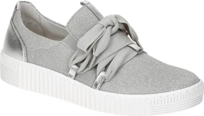A single silver sneaker is shown against a white background.