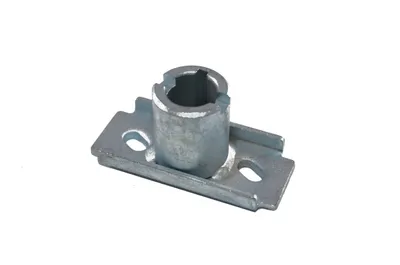 A metal part with a cylindrical opening and a flat base with screw holes, isolated on a white background.
