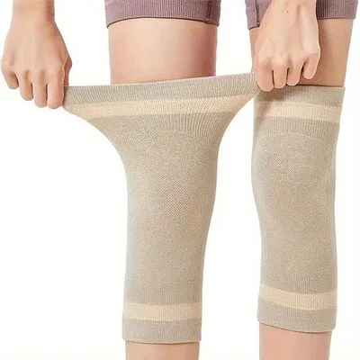 Immagine prodotto di Ginocchiere termiche, antivento ed elastiche, taglia L, adatte a persone con un peso corporeo compreso tra 70 e 85 kg, ideali per l'autunno e l'inverno.