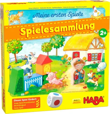 A colorful illustration of a farm scene on a game box, featuring animals, a house, and children's toys.