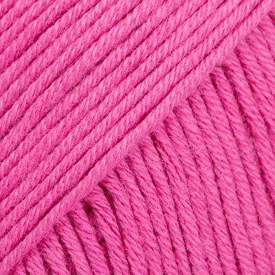 A close-up view of pink yarn.