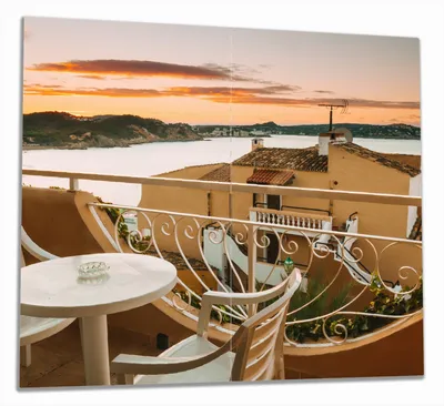 Produktbild von Wallario Herdabdeckplatte aus Glas, Größe 60 x 52 cm 2-teilig, Motiv Sommer in Spanien - Ausblick von einer schönen Terrasse auf das Meer
